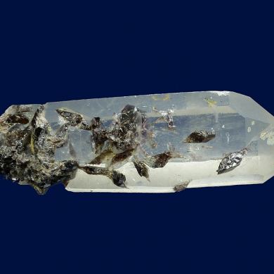 Ferroaxinite on Quartz