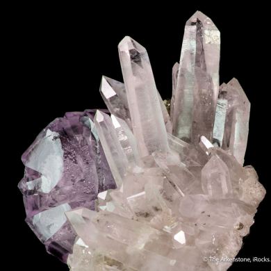 Fluorite (twinned) on Quartz