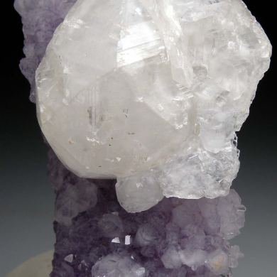 Calcite on Amethyst