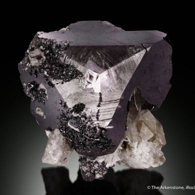 Bixbyite on Topaz