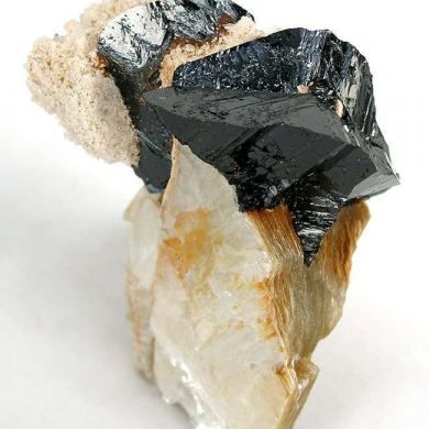 Cassiterite on Muscovite