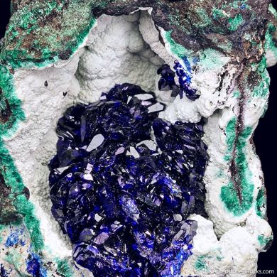 Azurite on Chalcoalumite on Malachite