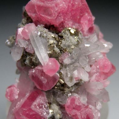 Rhodochrosite, Quartz on Pyrite