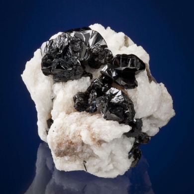 Cassiterite on Albite