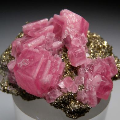 Rhodochrosite on Pyrite