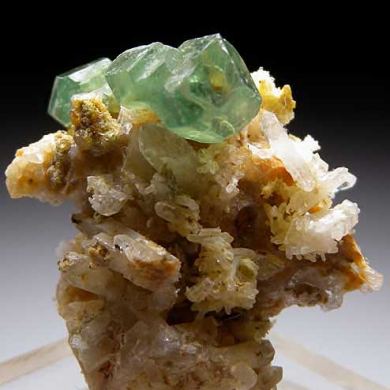 Demantoid Garnet on Quartz