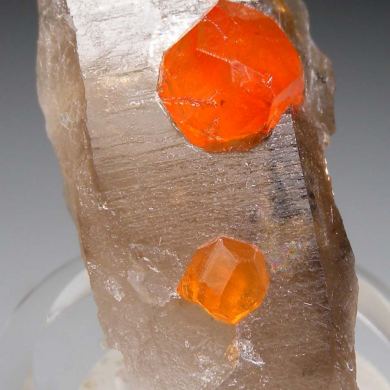 Spessartine on Quartz