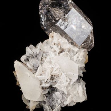 Quartz on Calcite with Anthraxolite (petroleum)