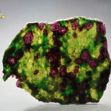 GARNET var. PYROPE, DIOPSIDE var. CHROMIUM-BEARING DIOPSIDE