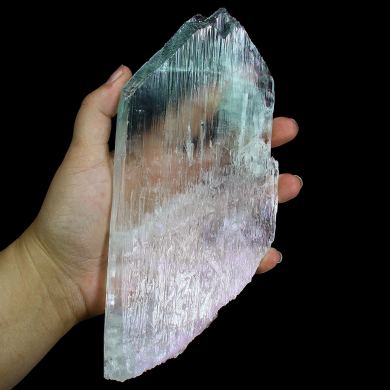 Spodumene /(var: “Kunzite”)(doubly-terminated,“floater” bi-color twinned crystal)