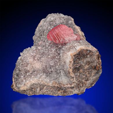 Rhodochrosite  on Quartz