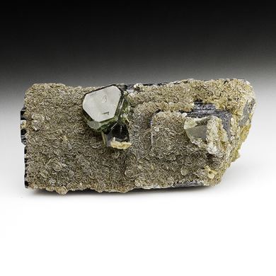 Fluorapatite with Ferberite, Siderite, Muscovite