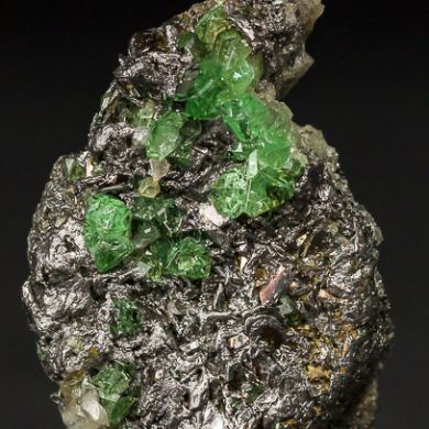 Tsavorite on Graphite