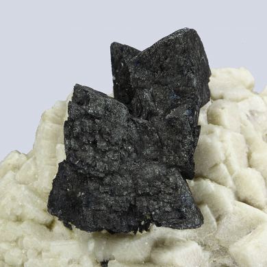 Hematite /(pseudomorph after Siderite) /on Microcline with Fluorite