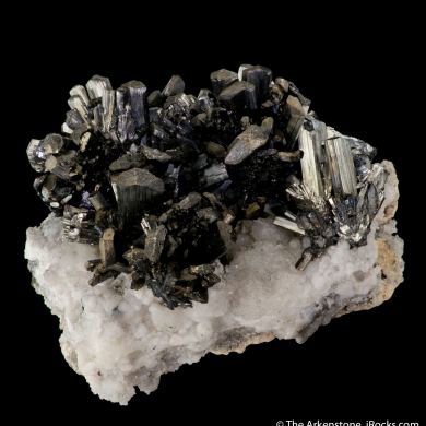 Stibnite on Calcite