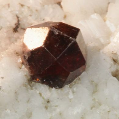 Spessartine garnet on Microcline